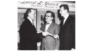 Marcel Duchamp presents Adolph Conrad (center) and W. Carl Burger (right) an award, 1960