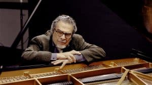 Leon Fleisher at a piano