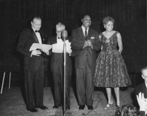 Charlie Singleton and Rose Marie McCoy receiving a BMI award