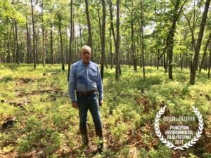 Forester Bob Williams stands in the Pine Barrens