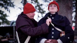 Videographer Jack Stawowczyk has his uniform adjusted